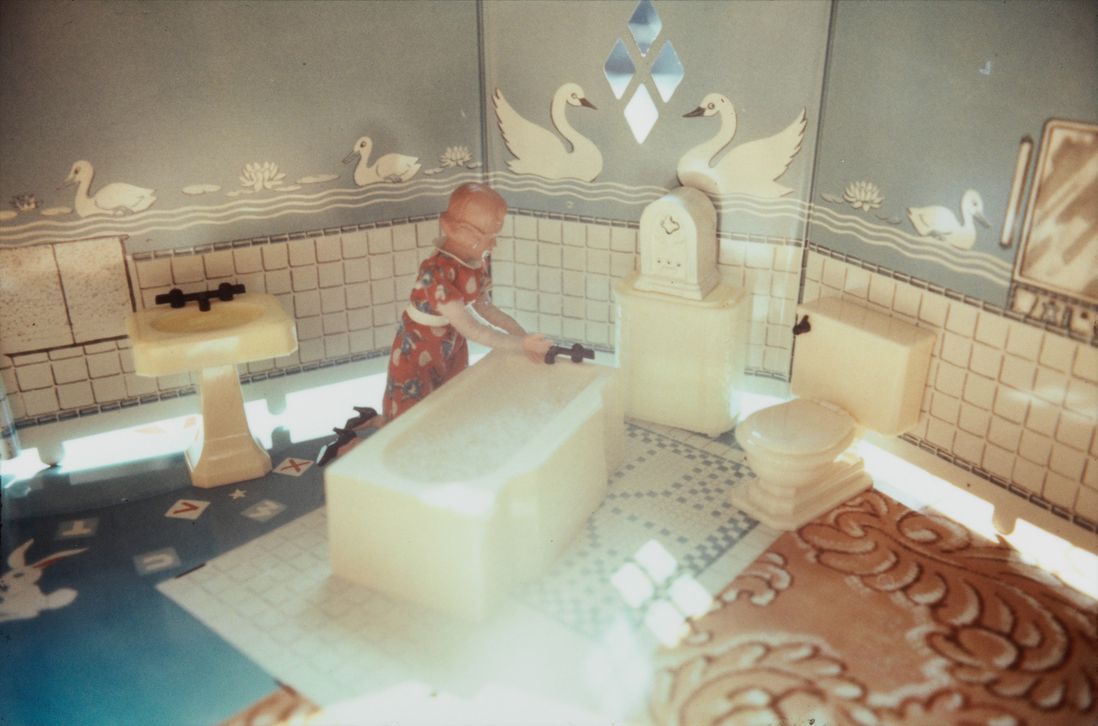 "First Bathroom/Woman Kneeling" by Laurie Simmons. Selected by Paul Chan.